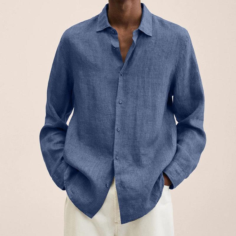 Crisp white men's classic button down long sleeve shirt, a versatile top for summer smart casual outfits.