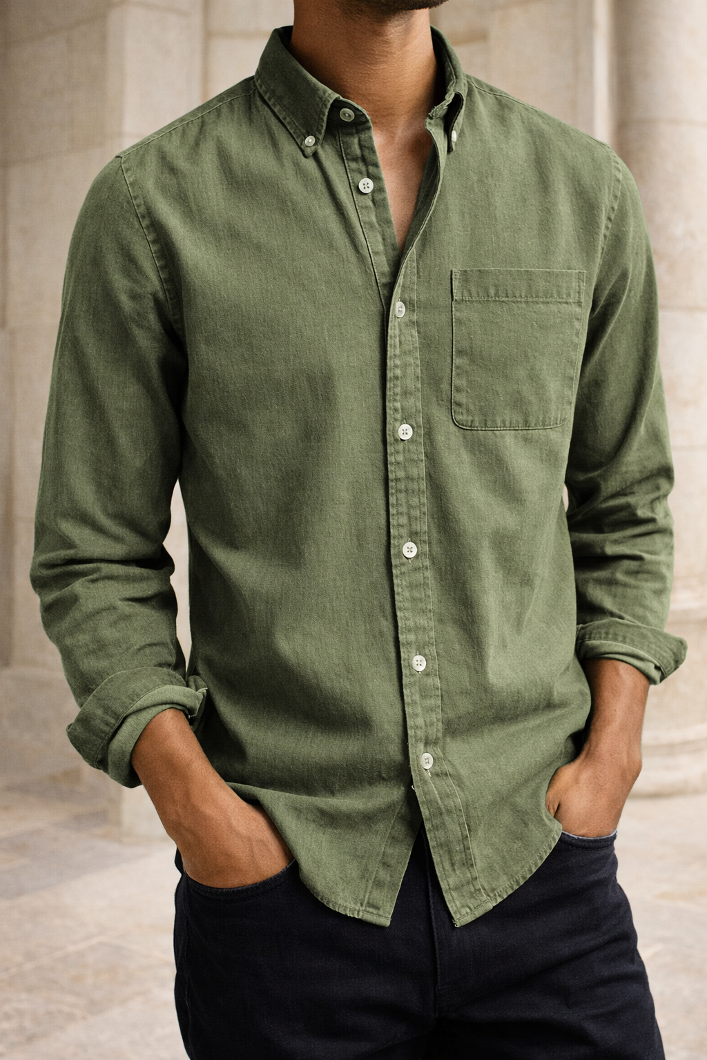 Man wearing a classic long sleeve button-down shirt, perfect for smart casual looks, office or weekend fashion.