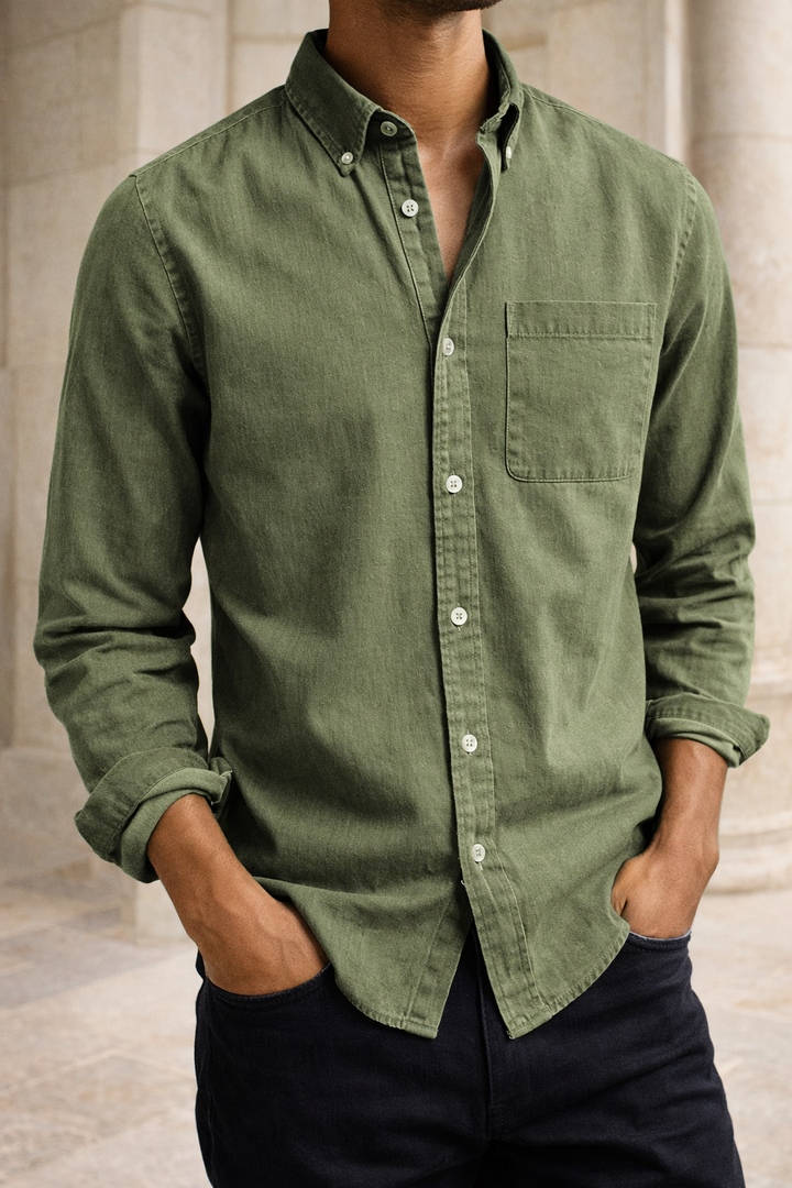 Man wearing a classic long sleeve button-down shirt, perfect for smart casual looks, office or weekend fashion.