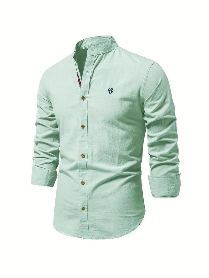Man wearing a casual long sleeve button-front shirt with jeans, ideal for everyday spring fashion.