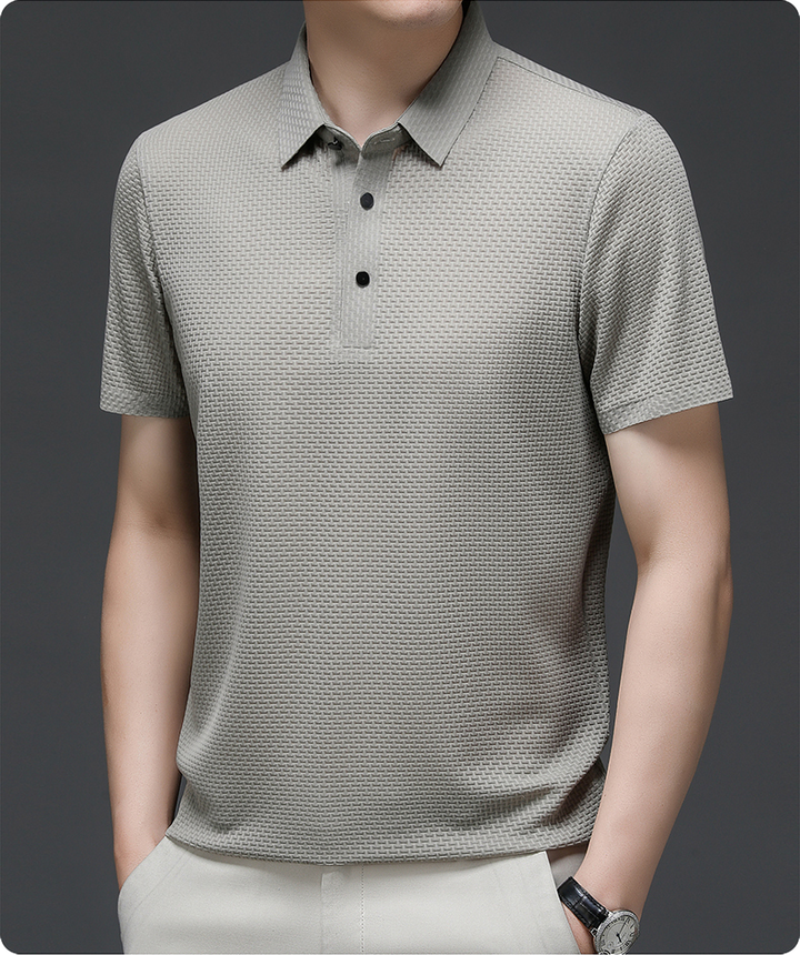 Stylish men's classic polo shirt with button-up collar, great for summer airflow.