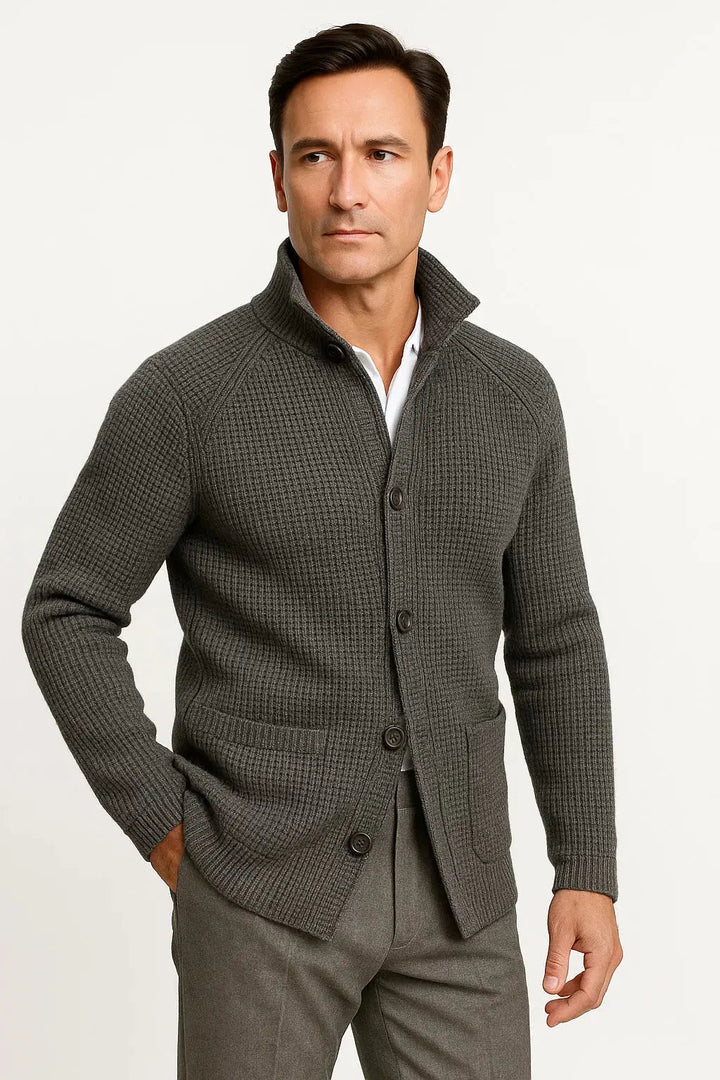 Man wearing a stylish buttoned cardigan over a t-shirt, demonstrating casual everyday fall fashion.