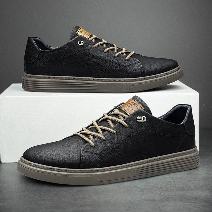 Black men's classic Oxford sneakers, offering comfort and timeless style. Versatile casual footwear for everyday wear.