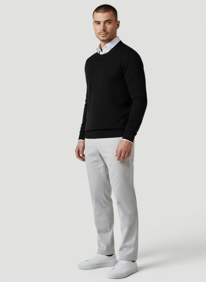 Soft knit men's casual crew neck sweater. Classic everyday pullover for versatile style and comfort.