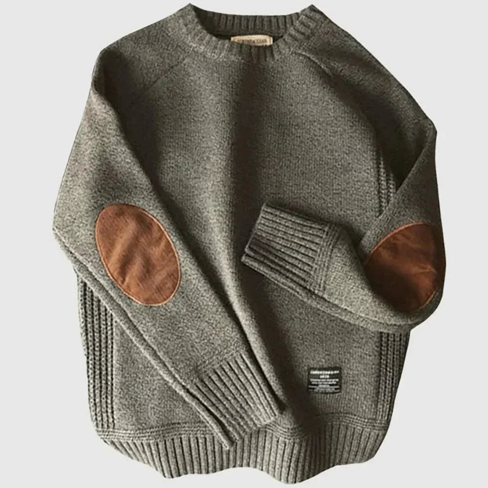 Men's classic crew neck sweater with stylish elbow patches, ideal for smart casual and layering.