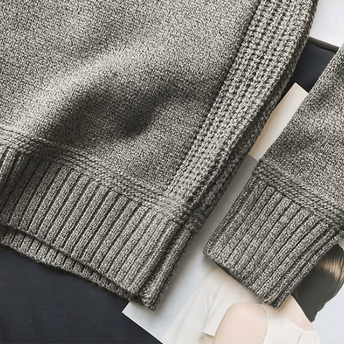 Soft knit men's long sleeve crew neck sweater with distinctive elbow patches for autumn and winter fashion.