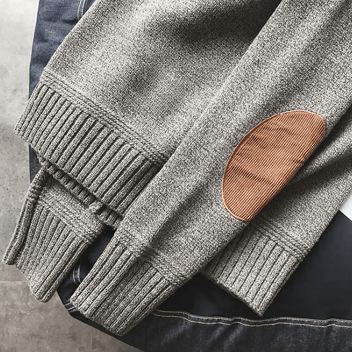 Stylish men's crew neck sweater, perfect casual wear, featuring trendy elbow patches. Great for layering.