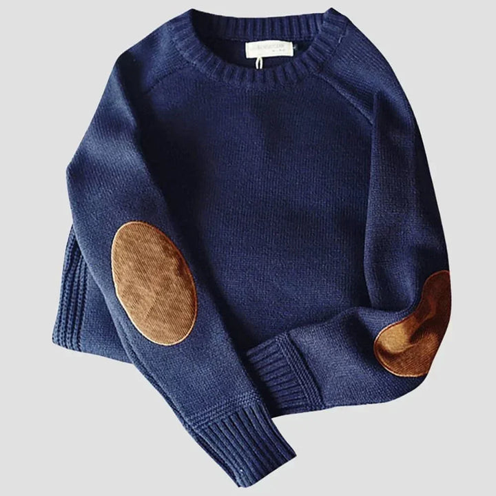 Modern men's crew neck sweater, a smart casual staple with fashionable elbow patches. Great autumn wear.