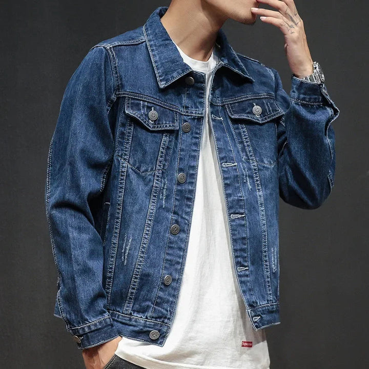 Stylish men's light jacket: classic distressed denim for a relaxed fit and urban everyday fashion.