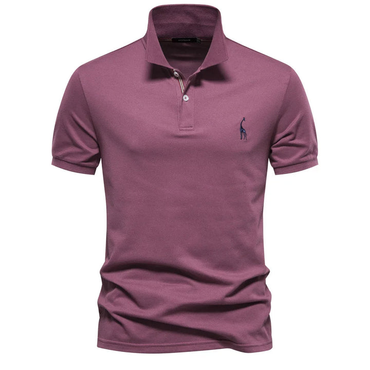 Detailed close-up of the subtle embroidery on a men's classic cotton polo shirt.