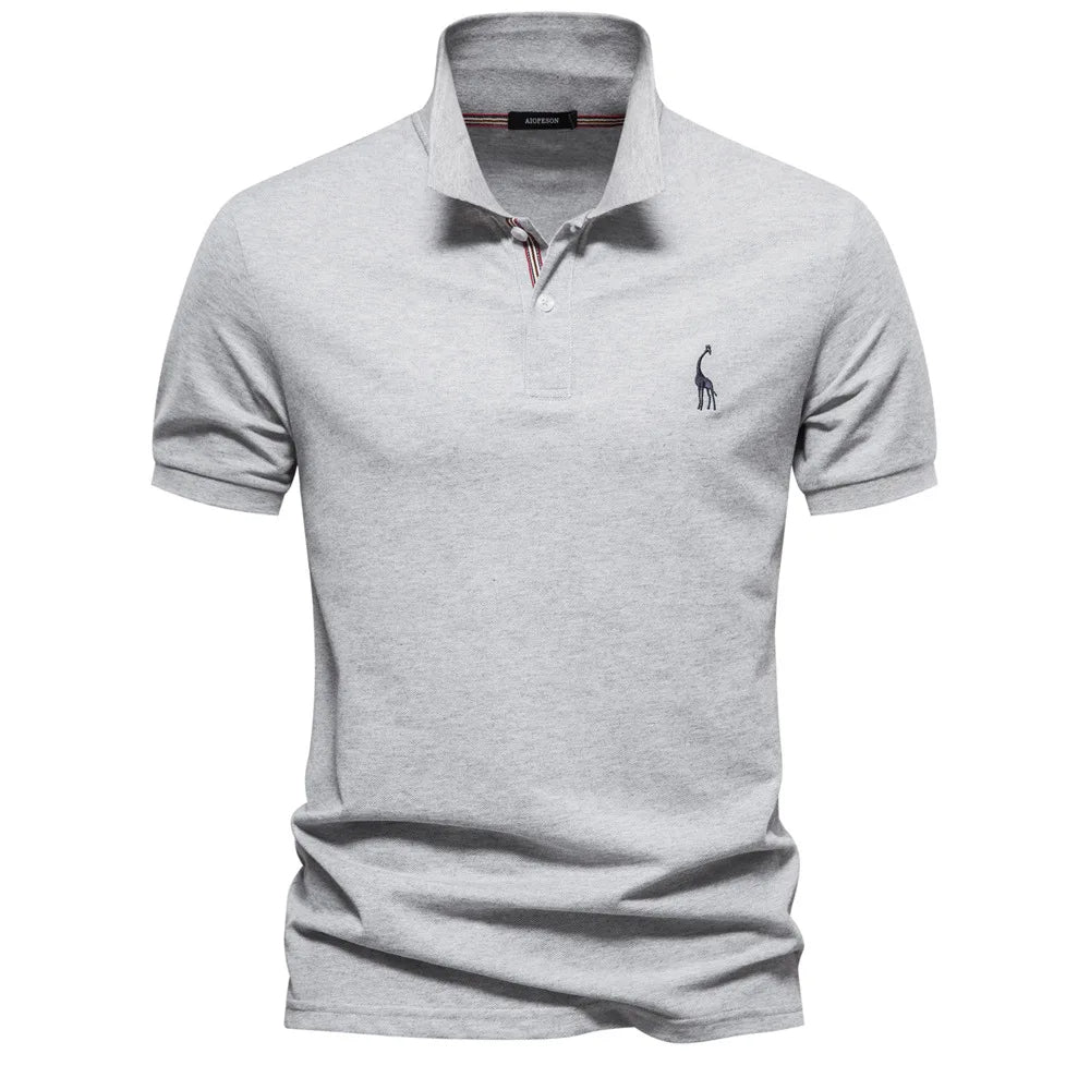 Timeless men's classic embroidered cotton polo shirt, neatly folded for display, new collection.