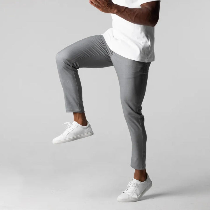 Versatile men's olive green chino pants, offering comfortable everyday wear & a modern fashion statement. Classic fit.