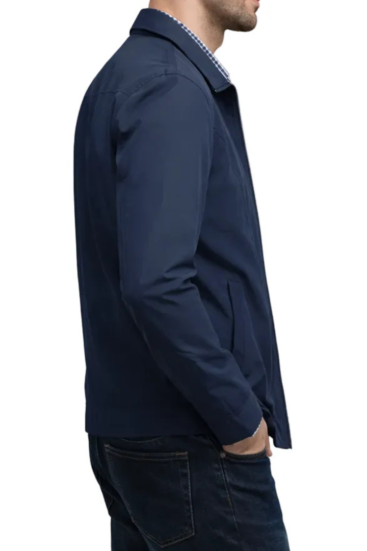 Classic zip-up Harrington jacket for men, designed with a stand collar, ribbed cuffs, and stylish plaid inner lining.