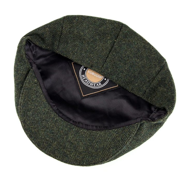 Elegant men's herringbone flat cap, ideal for a refined casual headwear look.