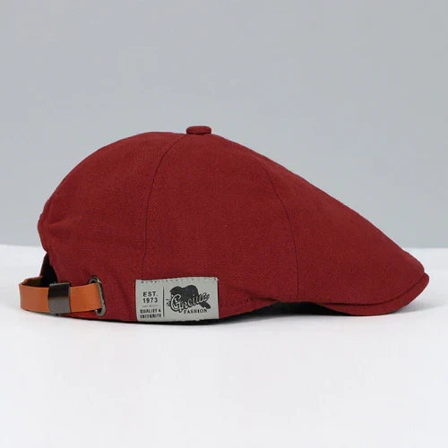 Classic men's ivy cap, a timeless flat cap or newsboy style, perfect for versatile casual headwear.