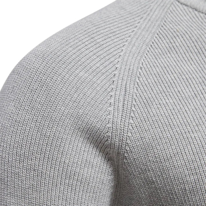 Essential men's classic half-zip jumper, a comfortable knitted sweater perfect for casual layering.