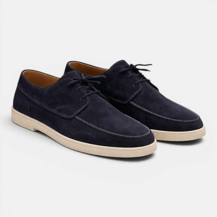 Sophisticated men's lace-up loafers, essential footwear for summer and smart casual occasions.