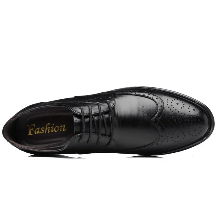 High-quality men's leather Oxford brogues, an elegant choice for any formal, business, or smart casual ensemble.