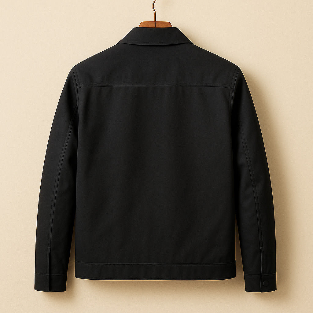 Man enjoying urban life, wearing a classic lined bomber jacket. Versatile transitional outerwear for men.