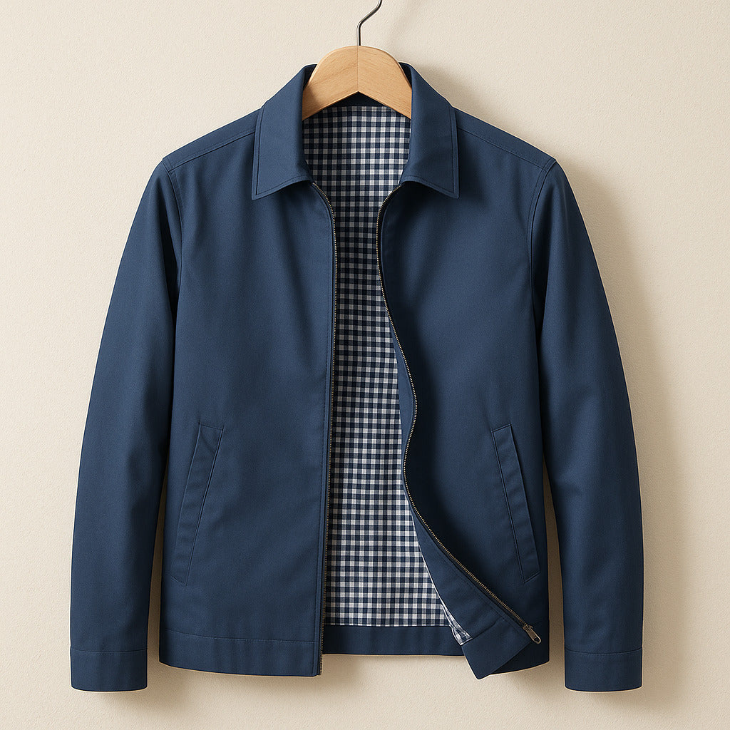 Close-up: Durable zip-up front & checked lining detail of a men's classic bomber jacket. Versatile outerwear.