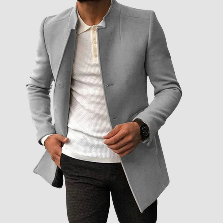 High-quality men's long coat. Stylish classic outerwear, ideal for elegant winter or formal fashion.
