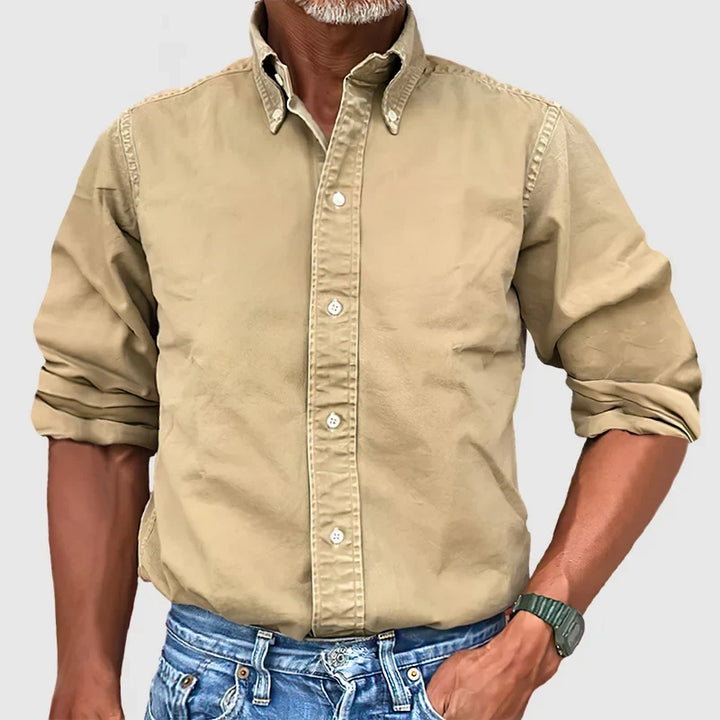 Classic men's long-sleeve button-down, a versatile shirt for formal or casual wear. Easy care, modern style.
