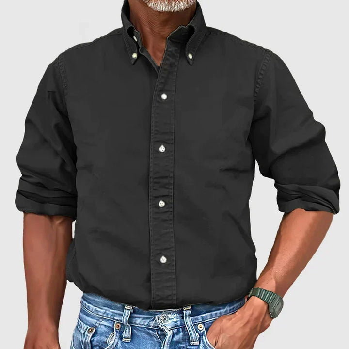 Classic men's long-sleeve button-down shirt, designed for versatile style. Easy care, ideal for modern men.