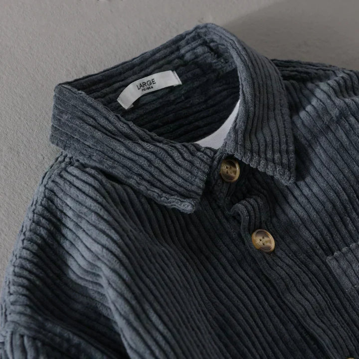 Timeless men's corduroy long sleeve button-up shirt, offering a comfortable fit and classic style for everyday wear.