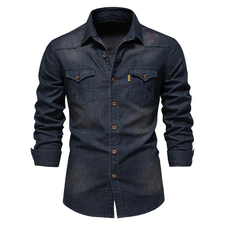 Durable denim button-up shirt for men, featuring long sleeves & a comfortable fit. Ideal for casual wear.
