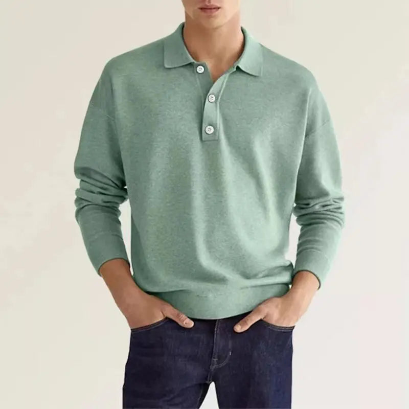 Close-up of a men's classic long-sleeve polo collar & button placket. Stylish and comfortable casual shirt.