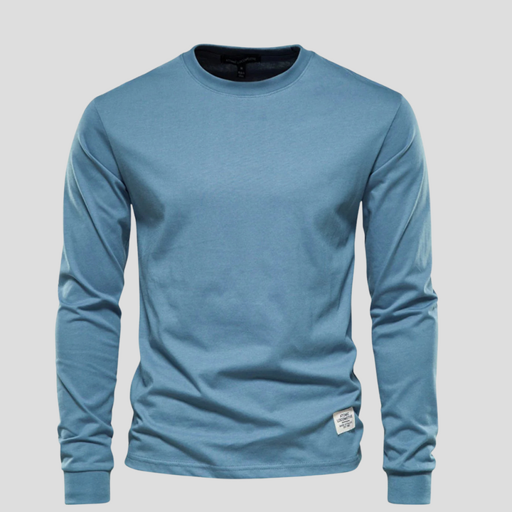 Modern classic men's long-sleeve round-neck shirt, combining comfort and style for versatile male fashion and daily wear.
