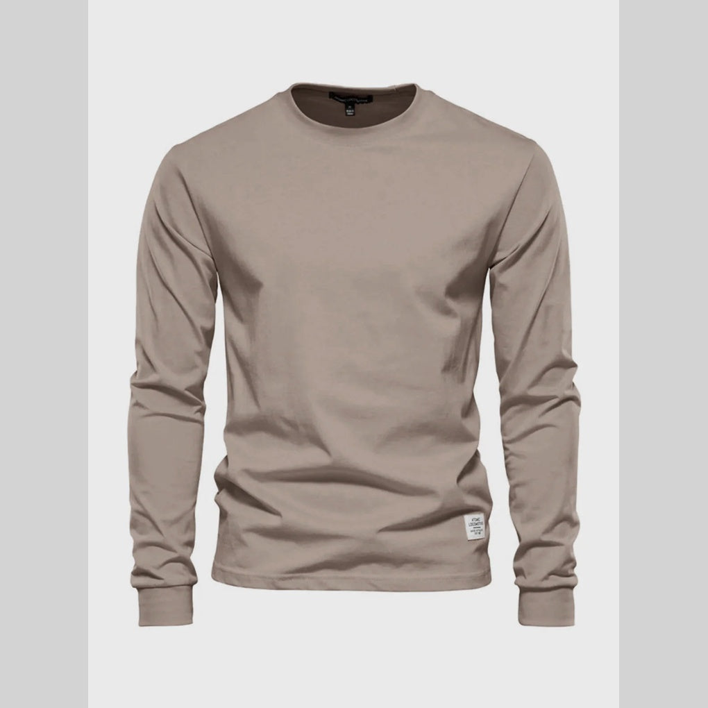 Comfortable men's long-sleeve crew neck shirt for active lifestyles or relaxed everyday wear. A versatile classic top.