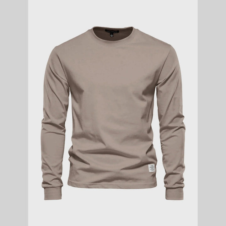 Comfortable men's long-sleeve crew neck shirt for active lifestyles or relaxed everyday wear. A versatile classic top.