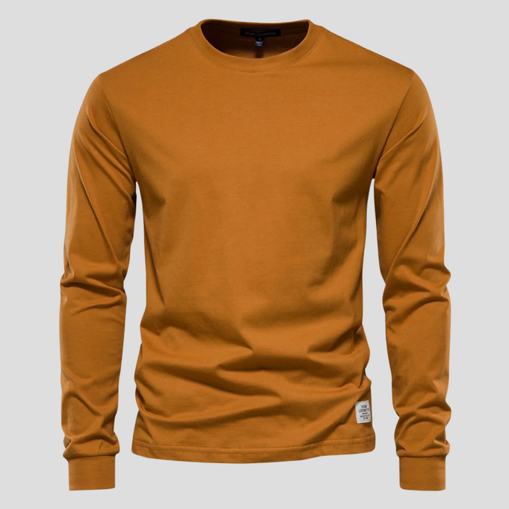 Versatile men's long-sleeve crew neck shirt, ideal for layering or casual everyday style. A comfortable male fashion classic.