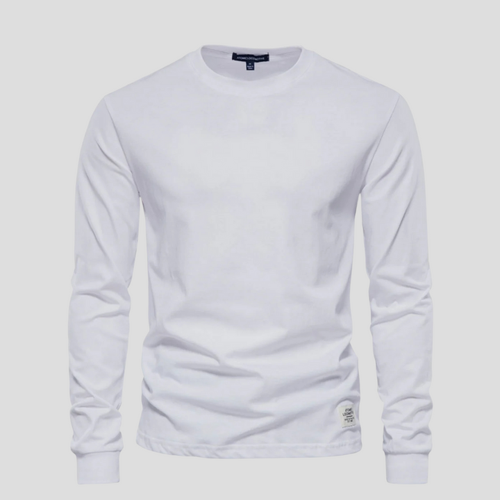 Stylish men's long-sleeve round-neck shirt in a solid color, offering a classic, comfortable look for daily wear.
