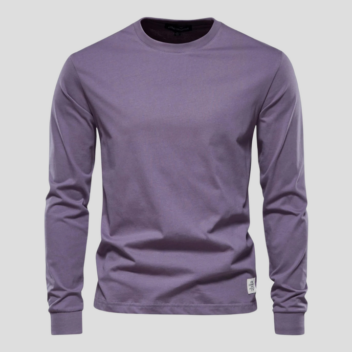 Simple yet stylish men's long-sleeve crew neck shirt, a timeless classic for versatile male fashion and comfort.
