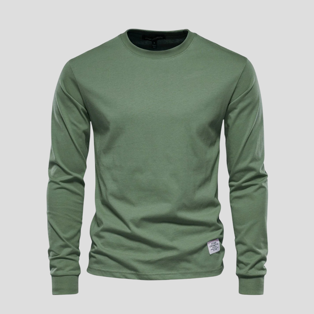 Well-fitting men's long-sleeve round-neck shirt, designed for classic everyday style and ultimate comfort. Essential top.
