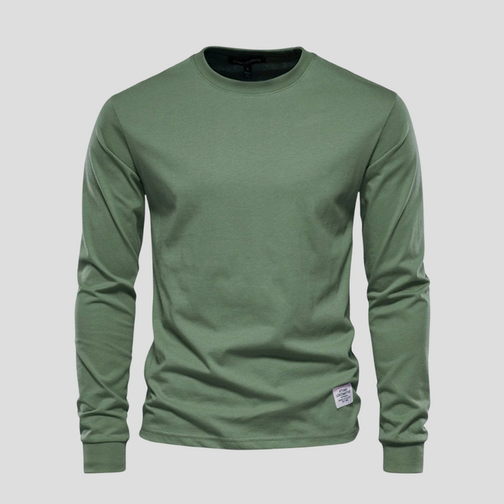 Well-fitting men's long-sleeve round-neck shirt, designed for classic everyday style and ultimate comfort. Essential top.