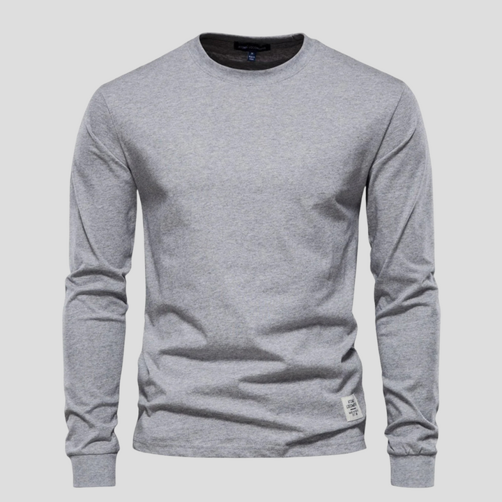 Soft-touch men's long-sleeve round-neck shirt, offering comfortable casual wear and a classic, versatile everyday look.