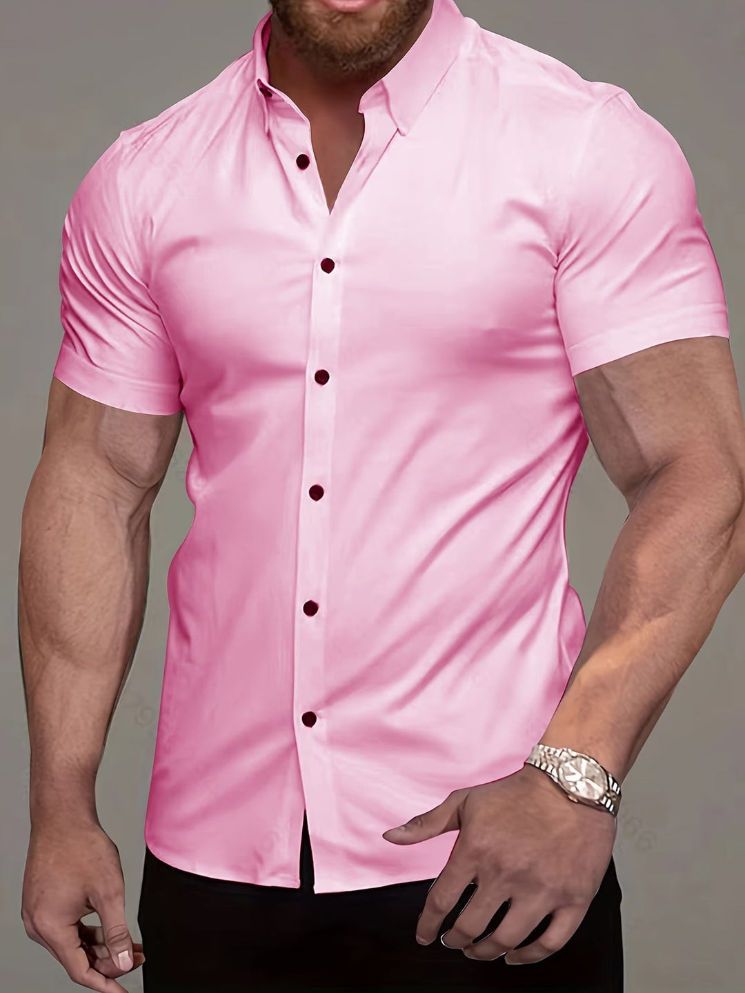 Comfortable men's muscle shirt with buttons, designed for a sleek, modern, and confident smart casual style.