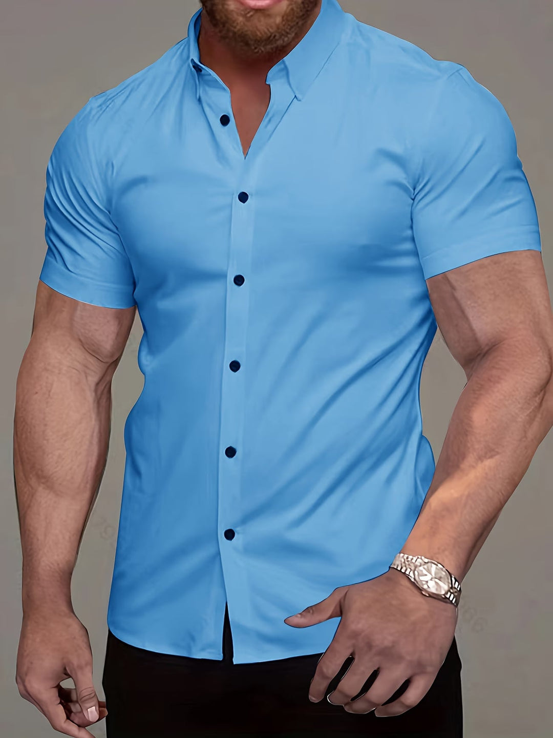 Men's short sleeve muscle fit button-up shirt in a classic style, excellent for versatile men's fashion.