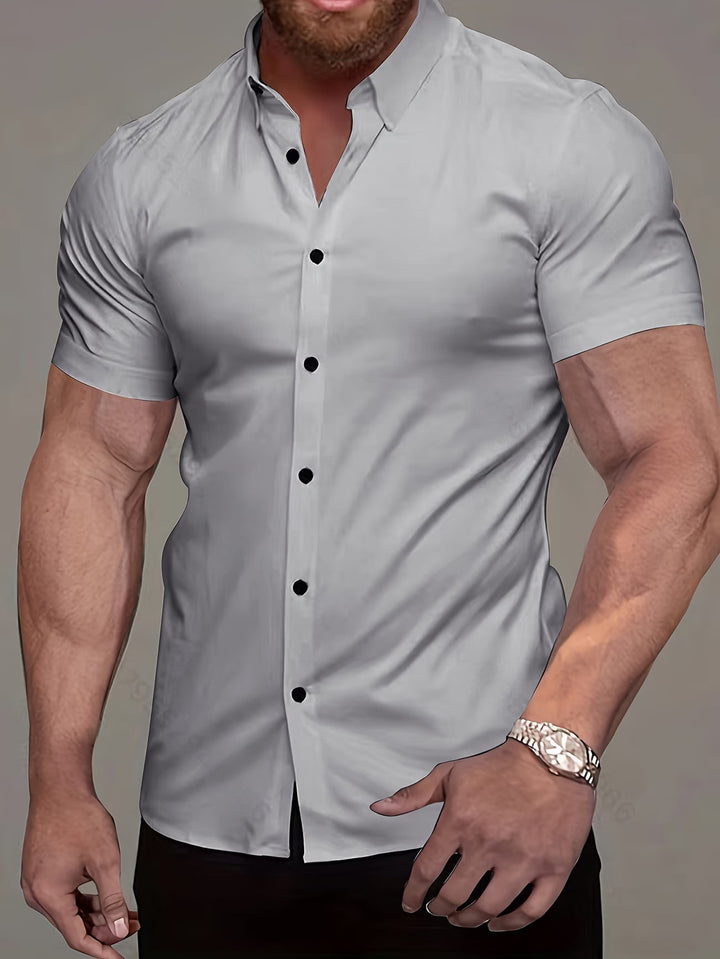 Modern men's muscle fit button shirt, offering a comfortable and sleek silhouette for any casual occasion.