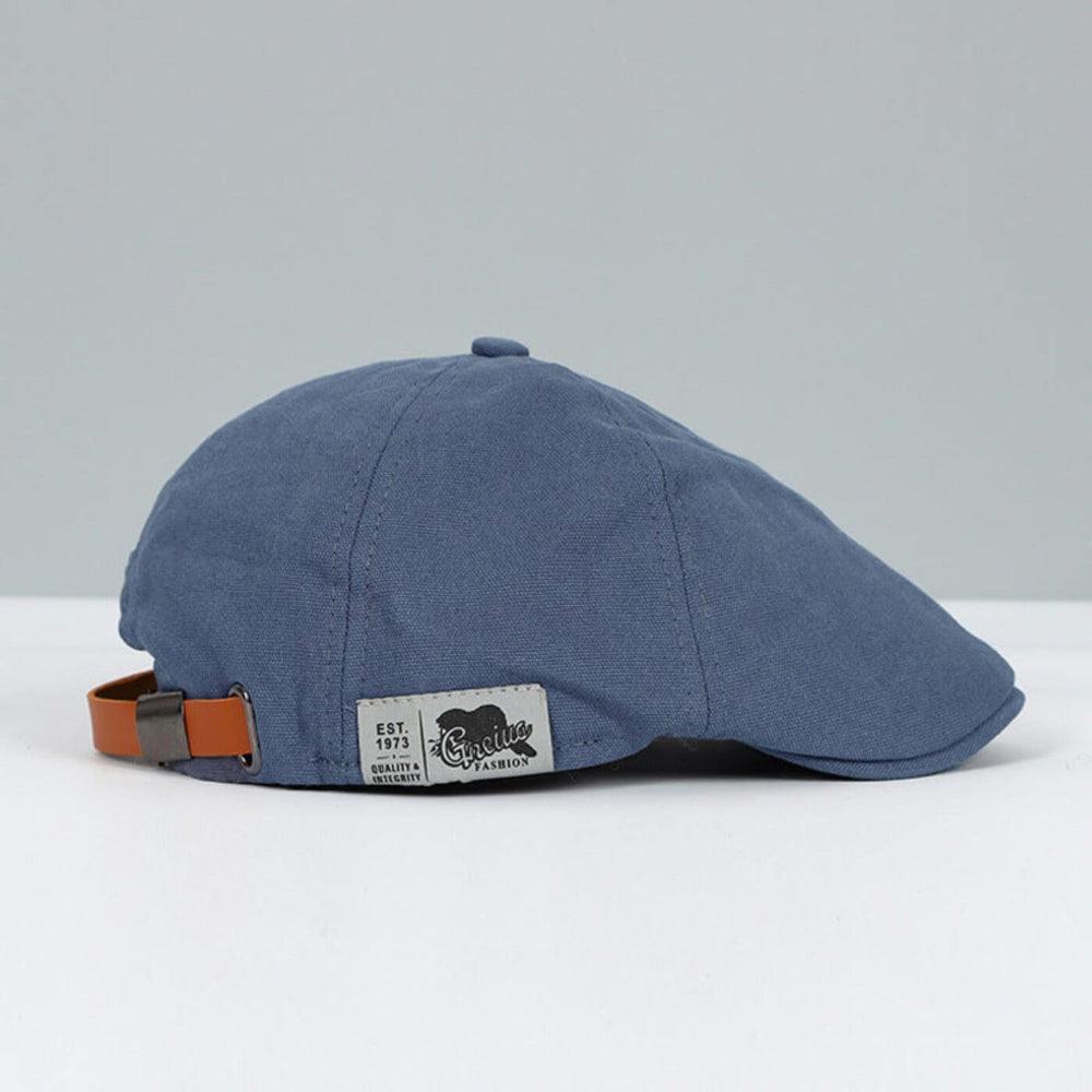 Classic men's fashion accessory: a stylish newsboy flat cap for a refined casual outfit.