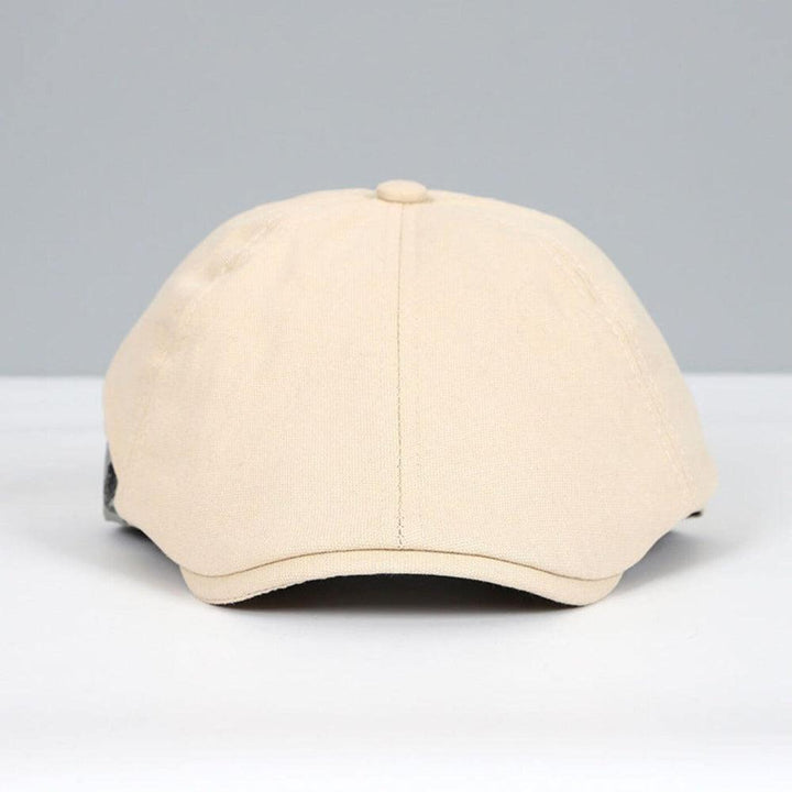 Men's traditional newsboy flat cap, a stylish headwear accessory for vintage-inspired fashion.