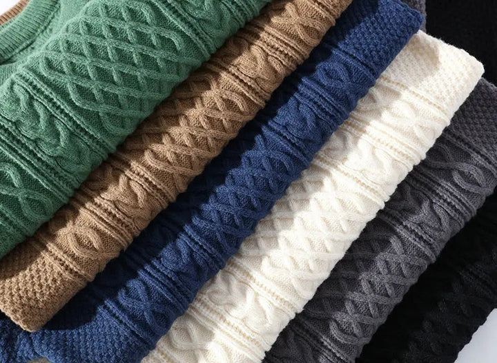 Classic men's long-sleeve crewneck sweater featuring an intricate patterned, textured knit design.