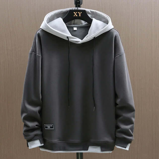 Stylish black men's hooded sweatshirt, a classic pullover design with a cozy hood and convenient pockets.