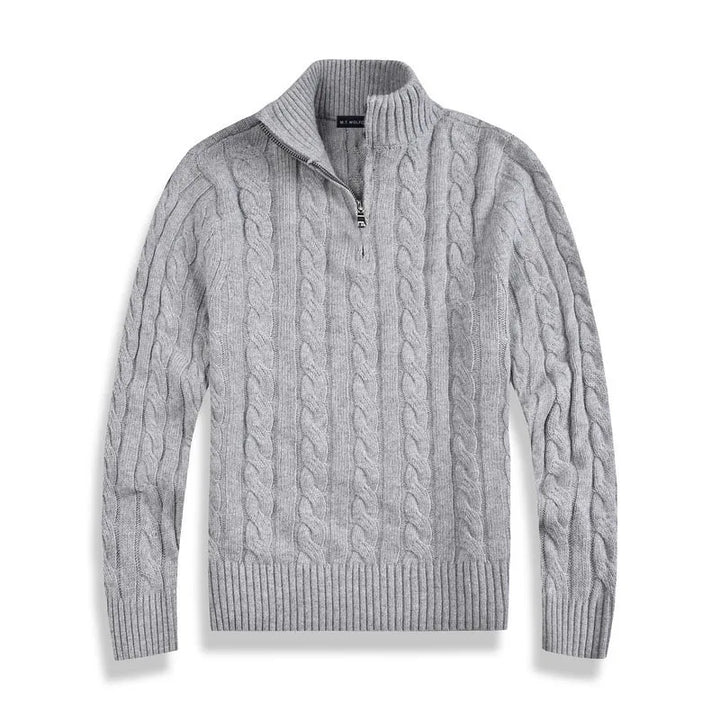 Classic men's pullover featuring a cozy cable knit pattern and stylish quarter-zip.