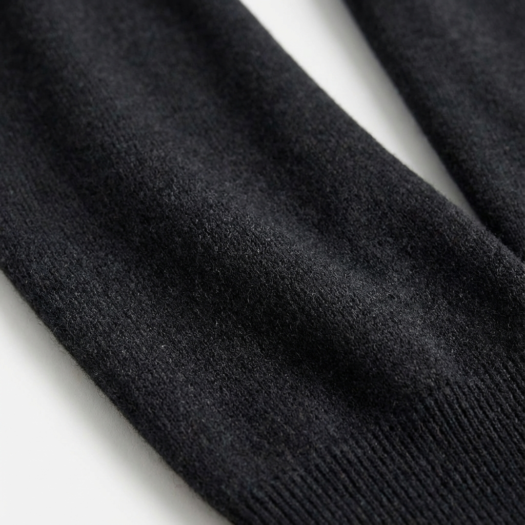 Long sleeve men's quarter-zip pullover sweater, offering a timeless smart-casual look for all seasons.