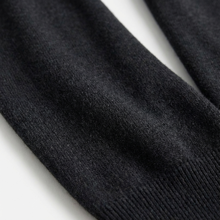 Long sleeve men's quarter-zip pullover sweater, offering a timeless smart-casual look for all seasons.