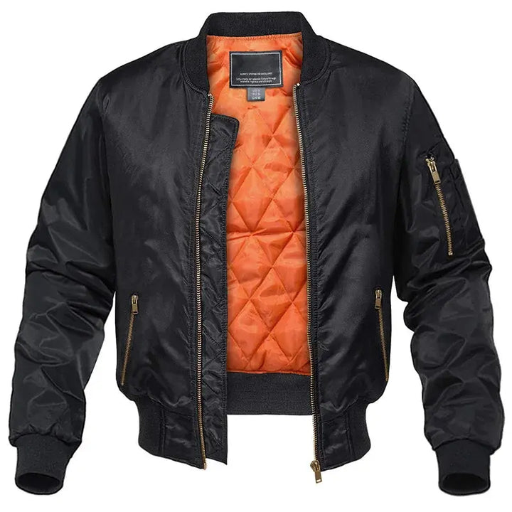 Stylish dark blue men's quilted bomber jacket featuring ribbed cuffs & classic pilot style for cool weather.